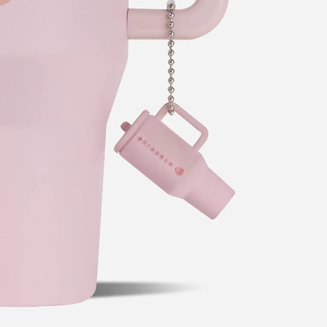 traveler-keychain-o9 Web-TravelerKeychainPhotos-PinkSand2.webp